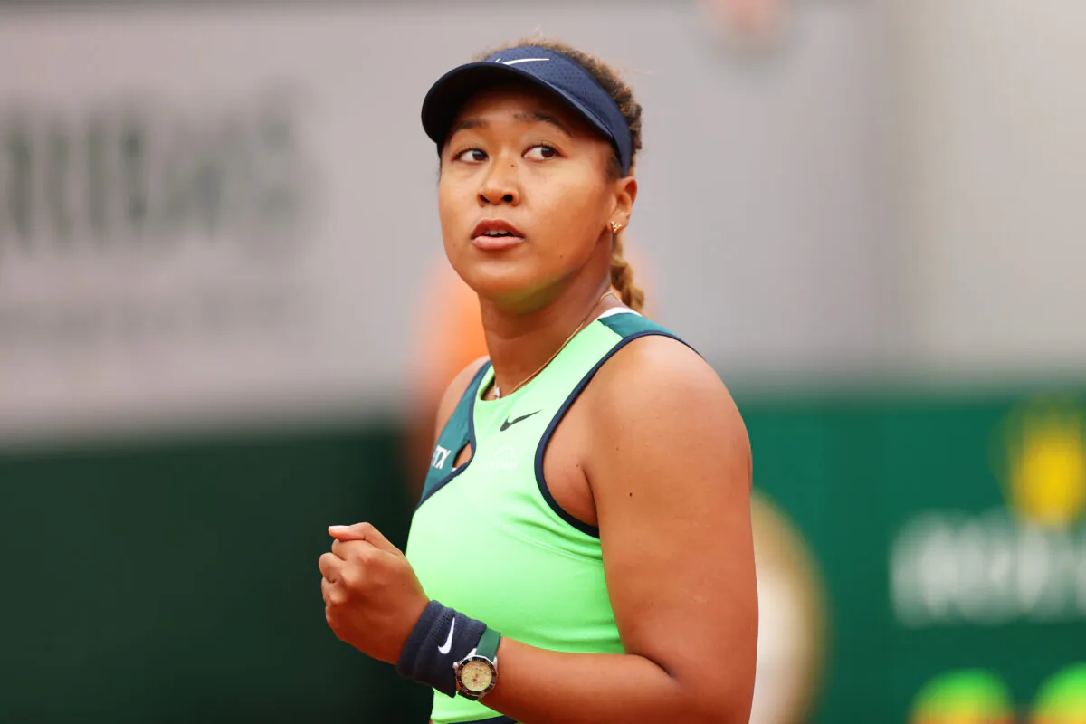 Naomi Osaka of Japan celebrates against Amanda Anisimova of USA during the Women's Singles First Round match on Day 2 of The 2022 French Open at Roland Garros, in Paris, France, on May 23, 2022. (Ryan Pierse/Getty Images)