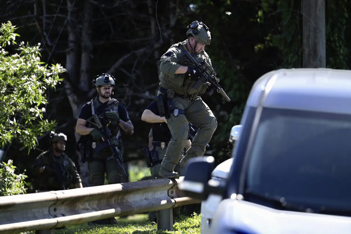 Police patrol outside a Macy's department store at Tysons Corner Mall in Tysons Corner, Va., on June 18, 2022. (Craig Hudson/The Washington Post via AP)