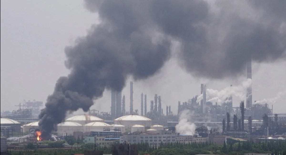 Smoke comes out from a Sinopec petrochemical plant in the Jinshan district of Shanghai in China on June 18, 2022, in a still from video. (Reuters/Screenshot via The Epoch Times)