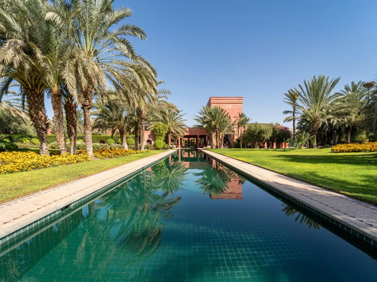 The centerpiece of this extraordinary property is a 200-foot-long swimming pool wrapped in a private park and palatial grounds. (Courtesy of Morocco Sotheby's International Realty)