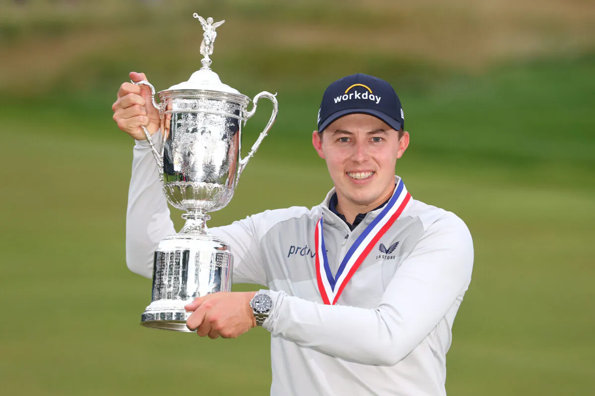 Matt Fitzpatrick of England celebrates with the U.S. Open Championship trophy after winning during the final round of the 122nd U.S. Open Championship at The Country Club in Brookline, Mass., on June 19, 2022. (Andrew Redington/Getty Images)