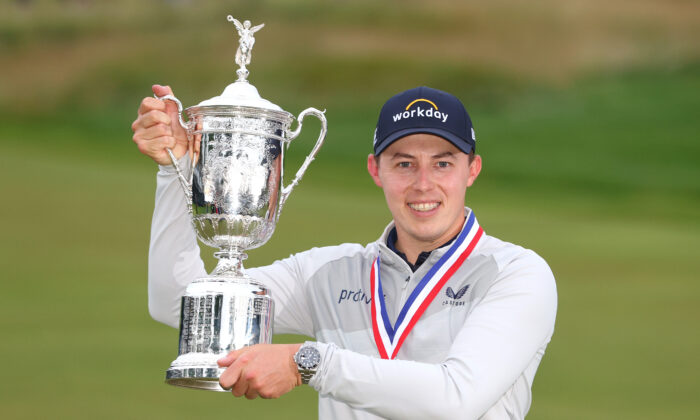 Matt Fitzpatrick of England celebrates with the U.S. Open Championship trophy after winning during the final round of the 122nd U.S. Open Championship at The Country Club in Brookline, Mass., on June 19, 2022. (Andrew Redington/Getty Images)