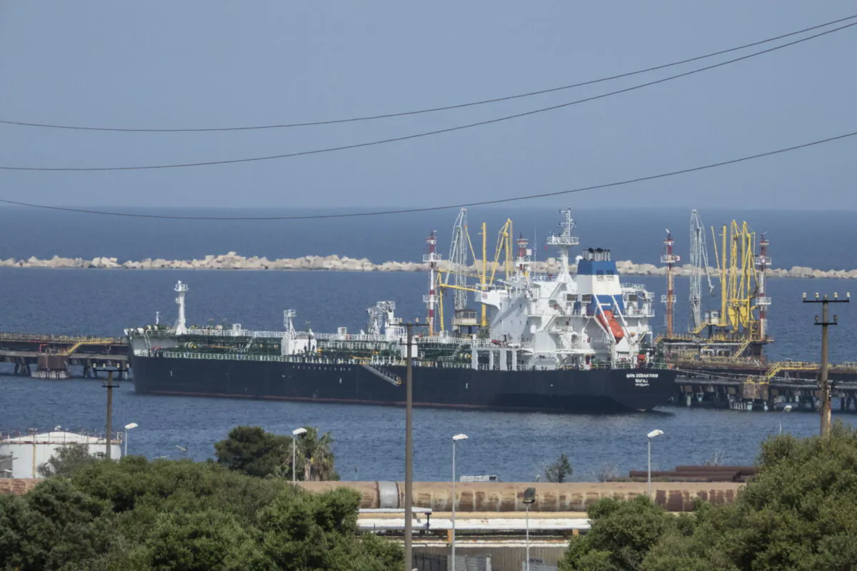 The San Sebastian oil tanker is moored at the docks of the ISAB refinery in Priolo-Gargallo near Syracuse, Sicily, on May 31, 2022. The ISAB, owned by Russia’s Lukoil, employs 1,000 people directly and another 2,500 in related activities. In an ironic turn, Italy has increased its imports of Russian oil in a period when the rest of Europe has been slashing its purchases from Moscow, even before the sanctions. That’s because banks have refused to take the risk of extending credit to Russia-controlled ISAB that would allow them to buy oil from non-Russian sources, even if financial sanctions did not specifically bar them from doing so. (AP Photo/Gaetano Adriano Pulvirenti)