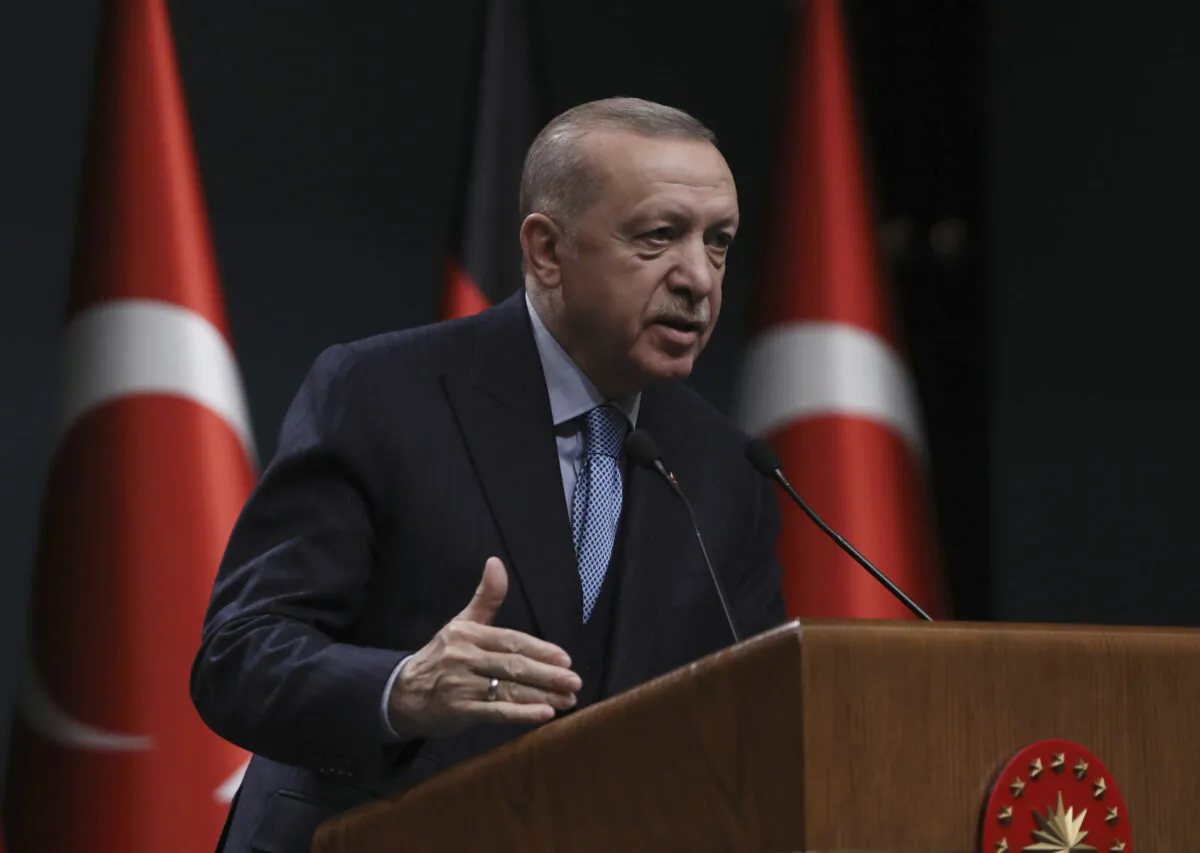 Turkey's President Recep Tayyip Erdogan speaks during a news conference, in Ankara, Turkey, on May 14, 2022. Within a two-week span, Turkey's president has caused a stir by throwing a wrench in Sweden and Finland's historic bid to join the NATO alliance, lashed out at NATO-ally Greece, and announced plans for a new incursion into Syria. (Burhan Ozbilici/AP Photo)