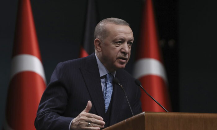Turkey's President Recep Tayyip Erdogan speaks during a news conference, in Ankara, Turkey, on May 14, 2022. Within a two-week span, Turkey's president has caused a stir by throwing a wrench in Sweden and Finland's historic bid to join the NATO alliance, lashed out at NATO-ally Greece, and announced plans for a new incursion into Syria. (Burhan Ozbilici/AP Photo)