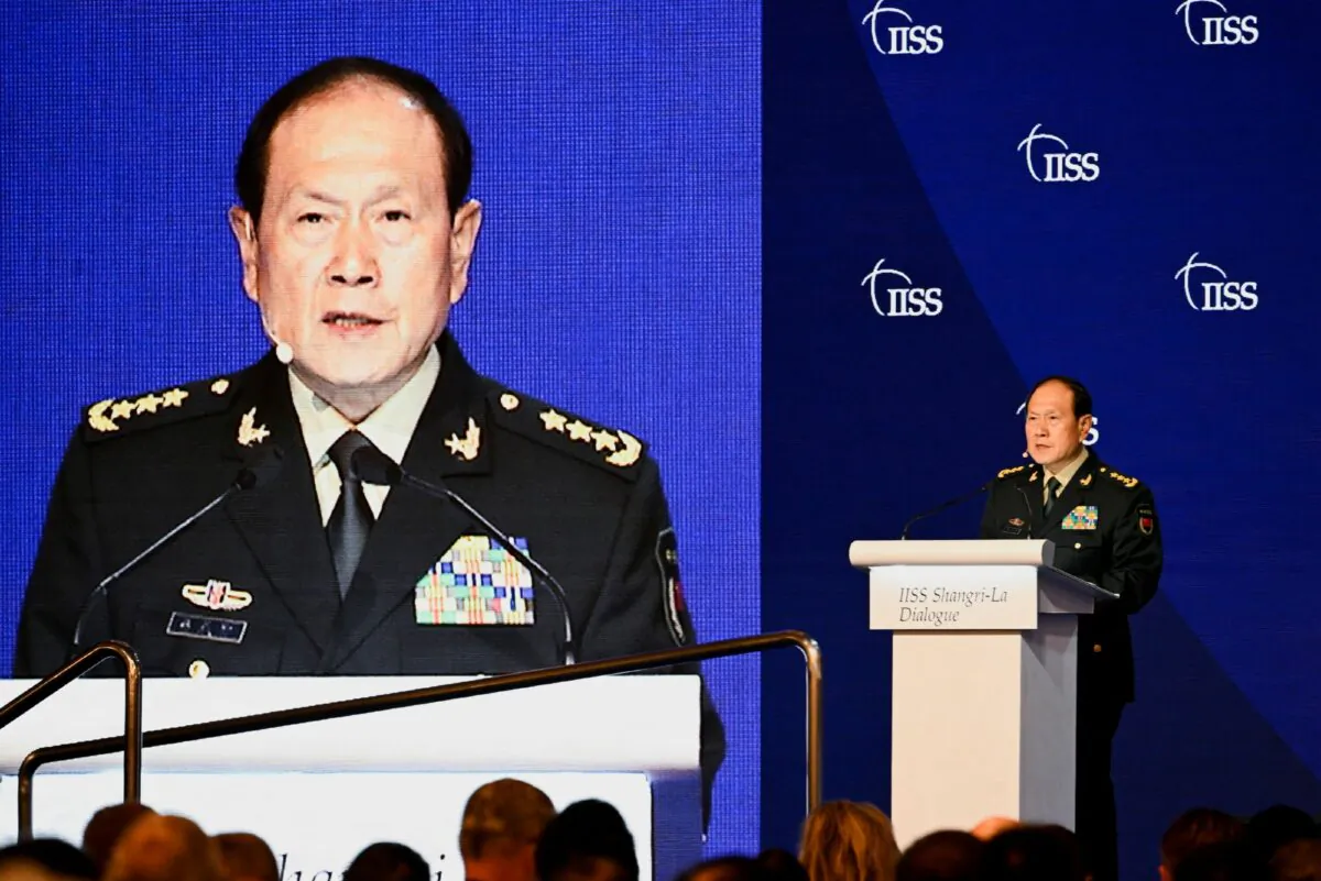China's State Councilor and Defense Minister General Wei Fenghe speaks at a plenary session during the 19th Shangri-La Dialogue in Singapore, on June 12, 2022. (Caroline Chia/Reuters)