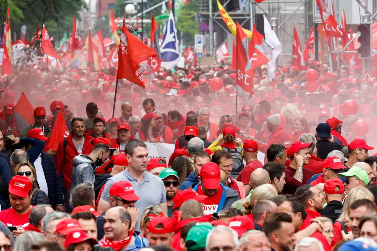 People take part in a demonstration over the rising cost of living in Brussels, Belgium, on June 20, 2022. (Yves Herman/Reuters)