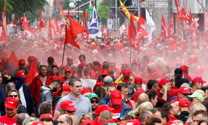 People take part in a demonstration over the rising cost of living in Brussels, Belgium, on June 20, 2022. (Yves Herman/Reuters)