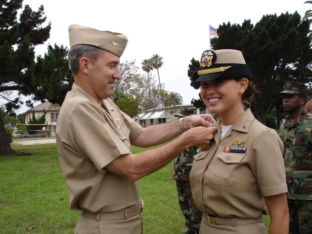 Burrill assumes the rank of lieutenant during a ceremony in San Diego, Calif., May 2006.