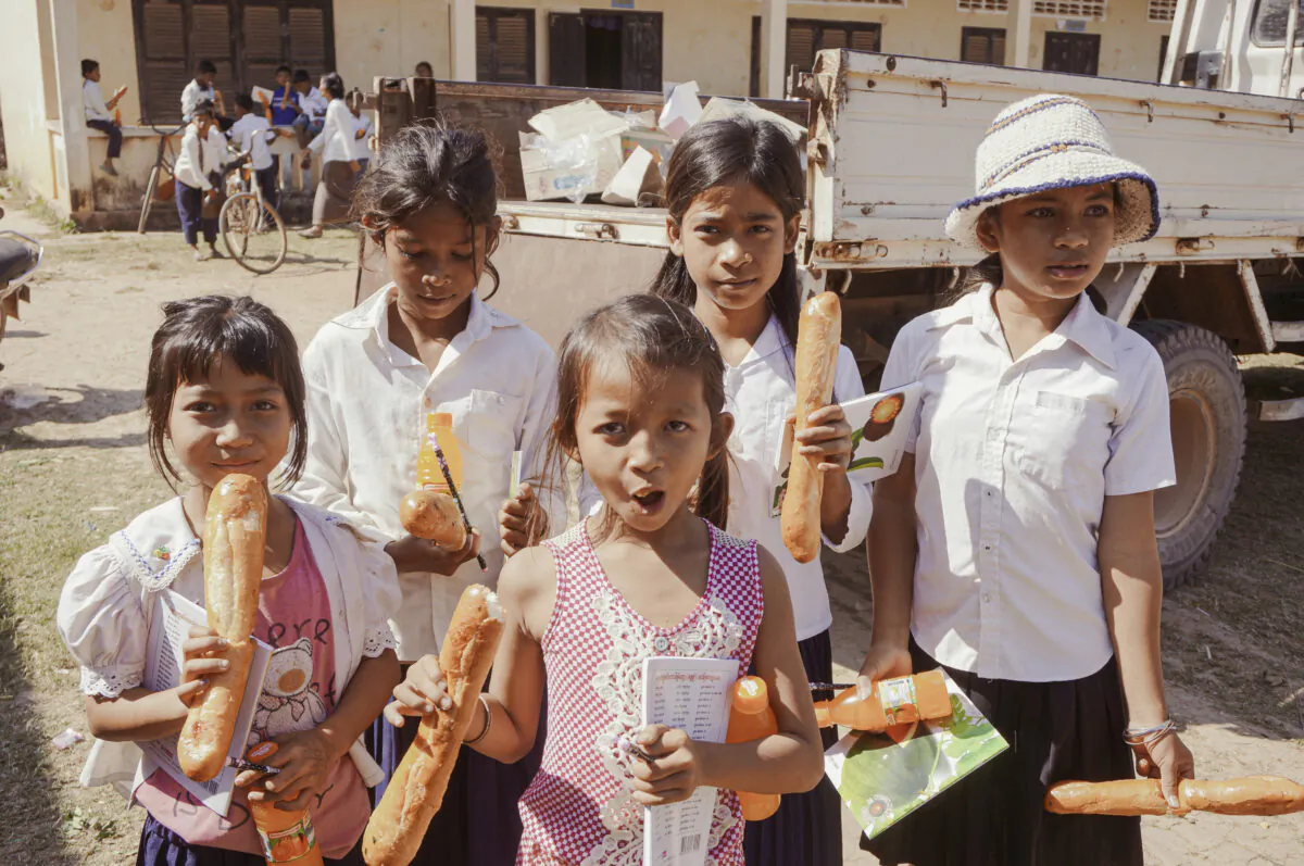 In 2017, Amanda Prak’s organization delivered food and supplies to a new primary school that it helped fund, in Battambang province, Cambodia. (Courtesy of H.O.P.E.)
