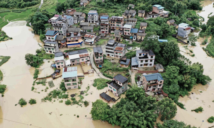 Flooded fields and buildings following heavy rains in Rongan in China's southern Guangxi region on June 13, 2022. (STR/AFP via Getty Images)