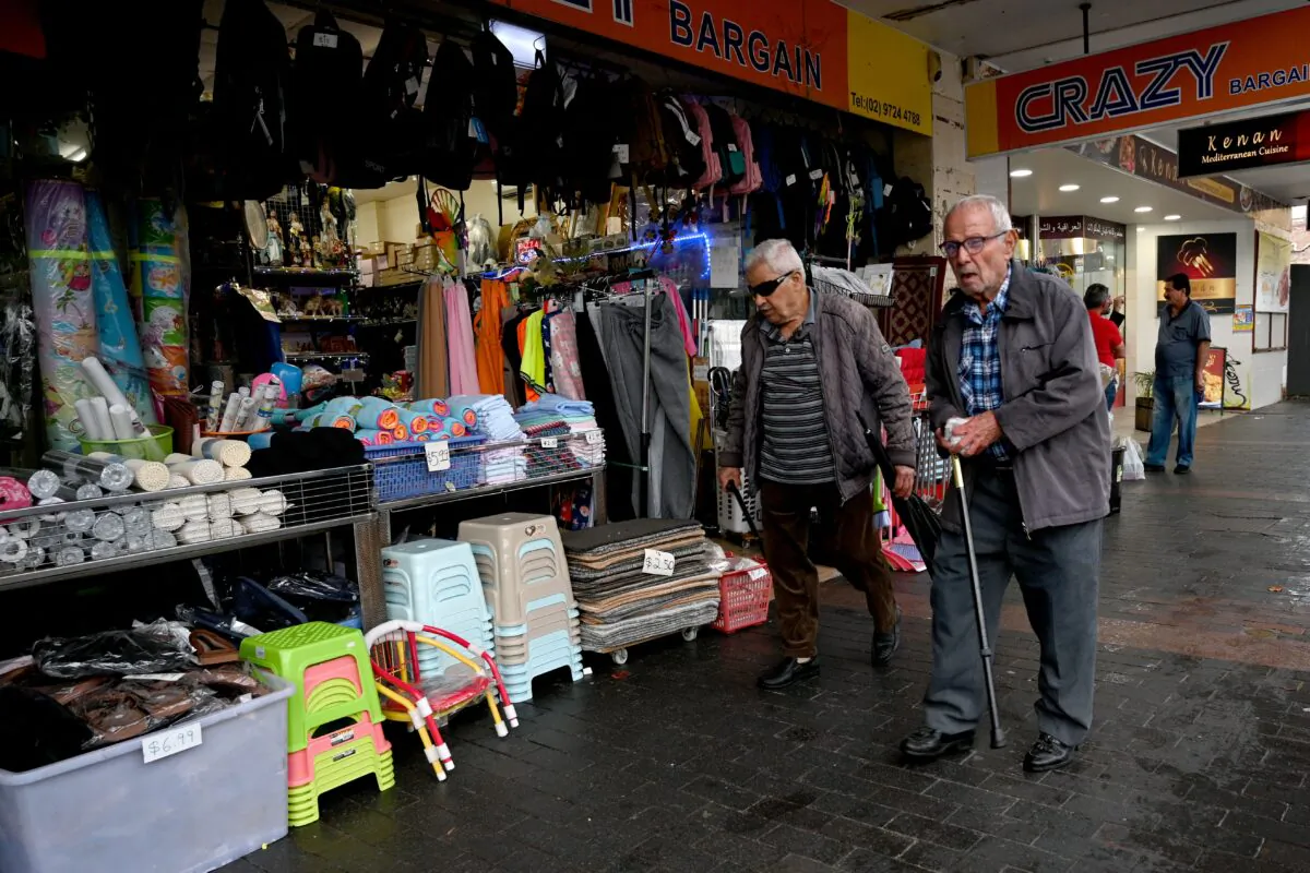 People shop at a market in a suburb of western Sydney, Australia, on April 27, 2022. (Saeed Khan/AFP via Getty Images)