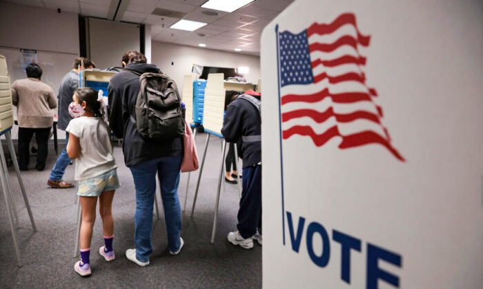 Voters cast ballots at the Fairfax County Government Center on November 02, 2021 in Fairfax, Virginia. (Chip Somodevilla/Getty Images)