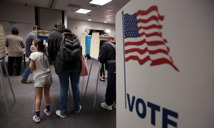 Voters cast ballots at the Fairfax County Government Center in Fairfax, Va., on Nov. 2, 2021. (Chip Somodevilla/Getty Images)