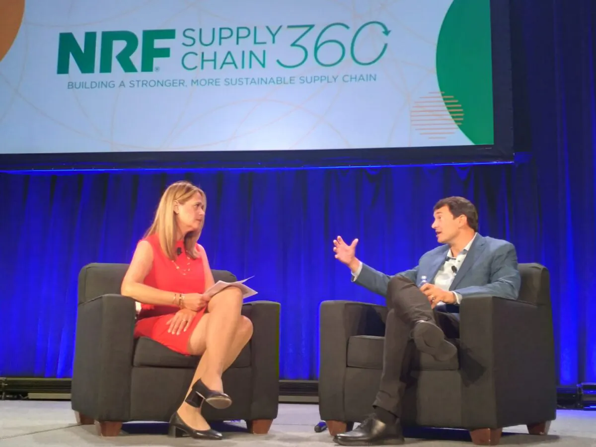Tractor Supply CEO Hal Lawton (R) was the keynote speaker at the National Retail Federation's Supply Chain 360 in Cleveland, Ohio, on June 20. Pictured on the left is CNBC editor of guests Lori Ann LaRocco, who moderated Lawton's talk. (Michael Sakal/The Epoch Times)