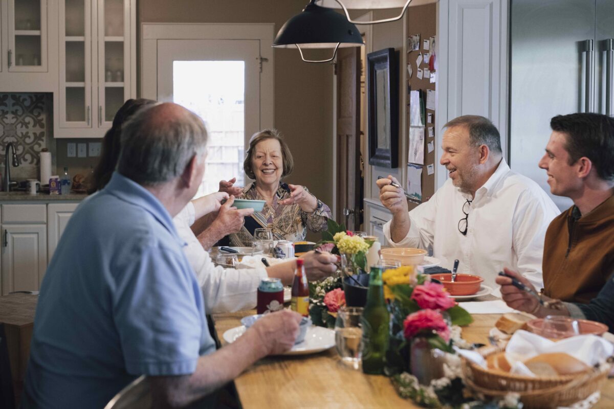 The Hayward family shares a meal together at a home in Covington, La. (Tatsiana Moon for American Essence)
