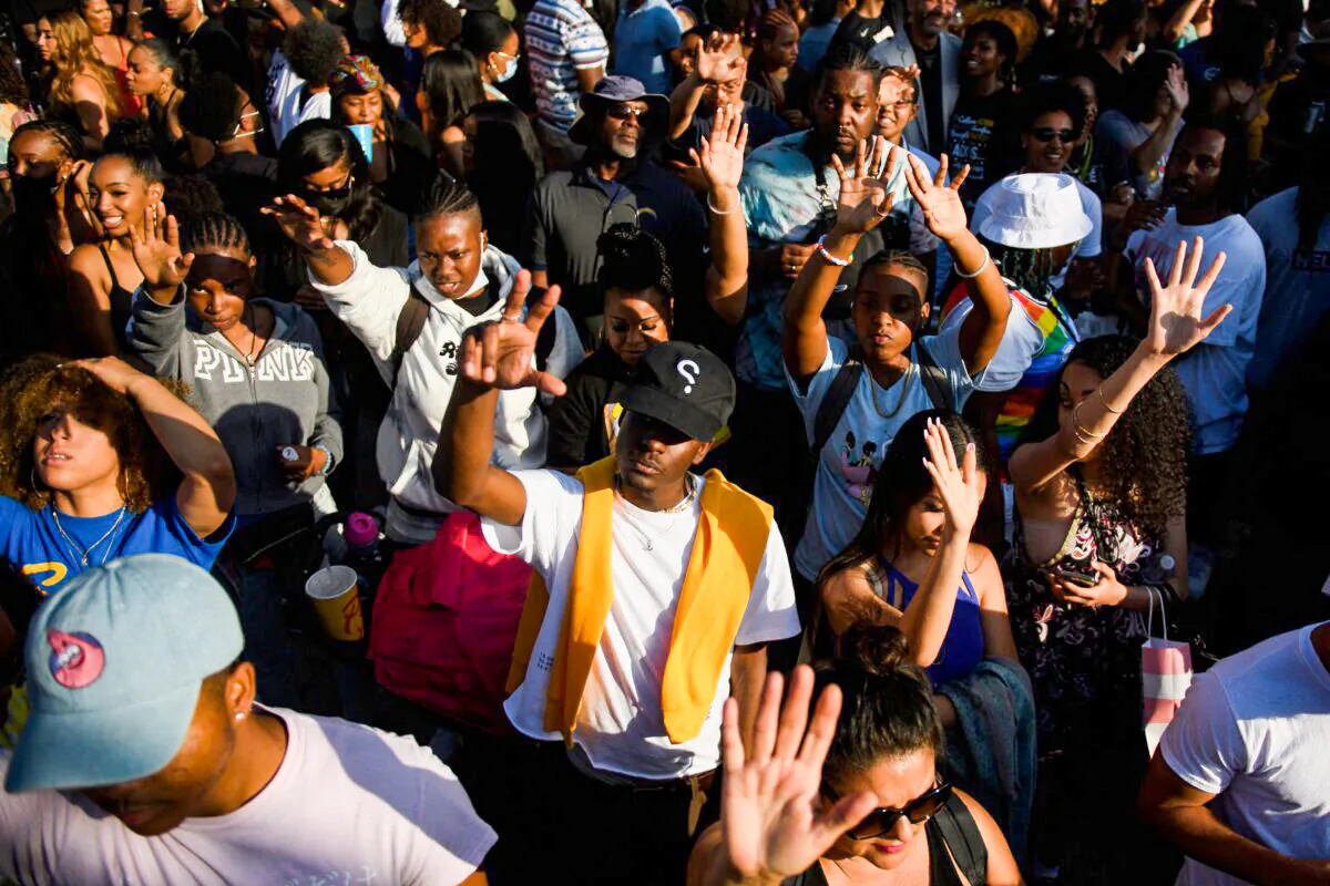 In this file photo, people attend the Leimert Park Rising Juneteenth celebration to mark the end of slavery, in the Leimert Park neighborhood of Los Angeles on June 19, 2021. (Patrick T. Fallon/AFP via Getty Images)