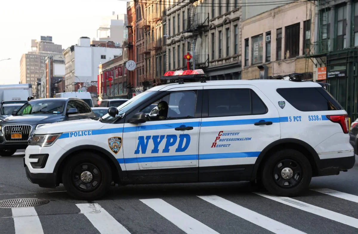 A police car drives through the Manhattan borough of New York on Jan. 14, 2021. (Spencer Platt/Getty Images)