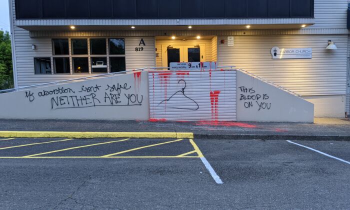 Graffitied threat claimed by pro-abortion group Jane's Revenge outside the Harbor Church in Olympia, Wash., on May 22, 2022. (Courtesy of Harbor Church)