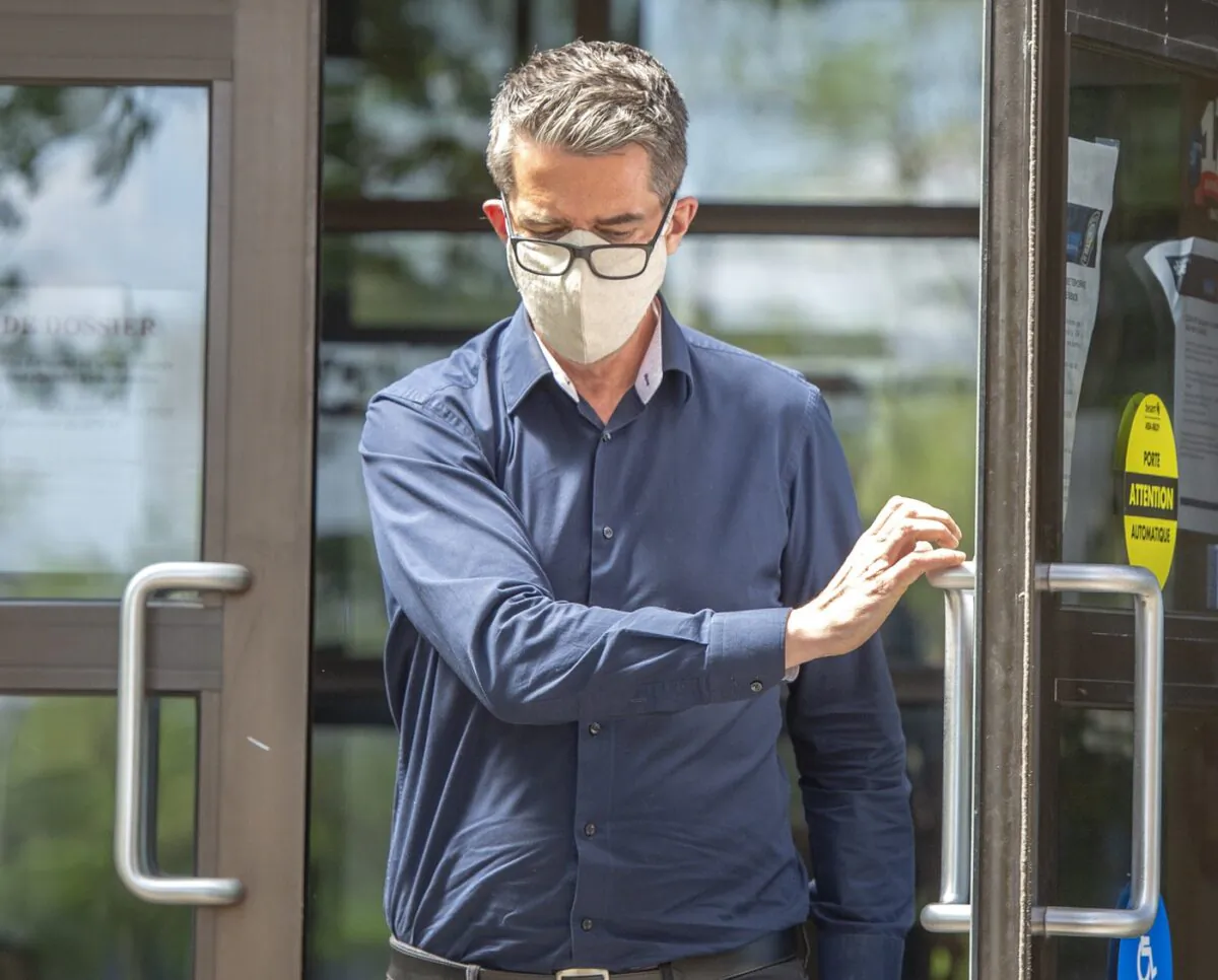 Former Parti Québécois leader Andre Boisclair leaves the police station on May 29, 2020 in Montreal. (The Canadian Press/Ryan Remiorz)