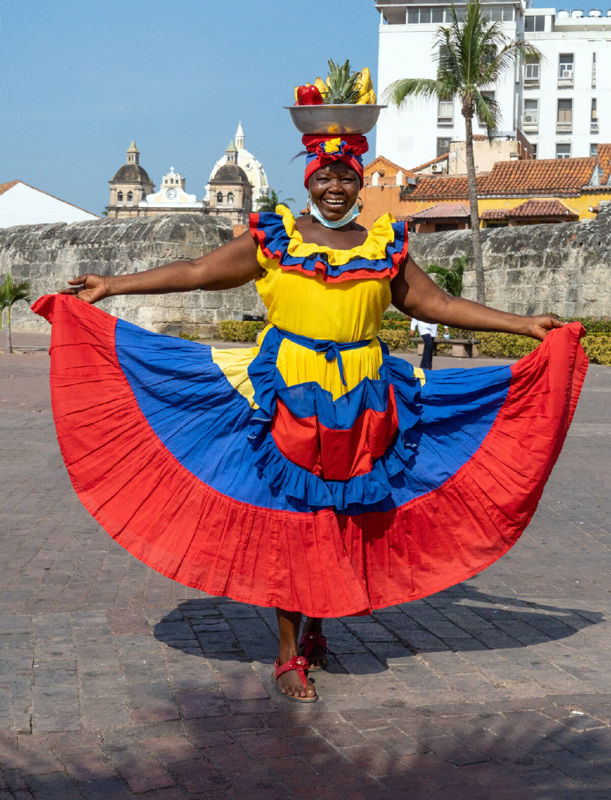 A local woman greets passengers from the Holland America Eurodam in Cartagena, Colombia.  (Photo courtesy of Doug Hansen)