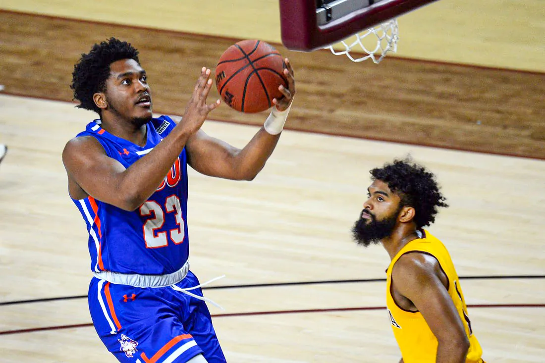 Houston Baptist Huskies guard Darius Lee (23) puts up a layup against Arizona State Sun Devils guard Remy Martin (1) during the first half at Desert Financial Arena in Tempe, Ariz., on Nov 29, 2020, (Joe Camporeale/USA TODAY Sports via Field Level Media)