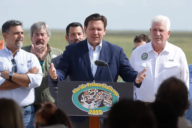 Florida Gov. Ron DeSantis (C) announced the 2022 Florida Python Challenge on June 16, 2022. (The Florida Channel/Screenshot  via The Epoch Times)