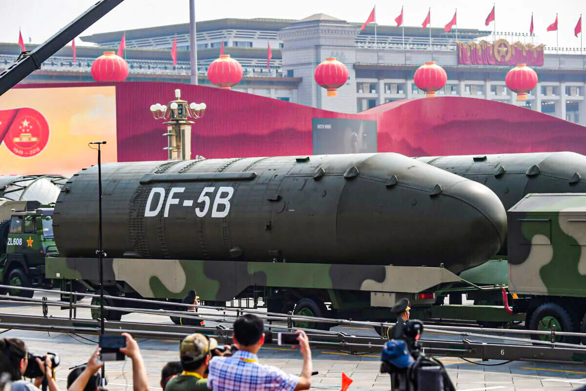 Military vehicles carrying DF-5B intercontinental ballistic missiles participate in a military parade at Tiananmen Square in Beijing on Oct. 1, 2019. (Greg Baker/AFP via Getty Images)