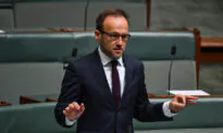Left-Wing Australian Greens Leader Removes National Flag Out of TV Sight