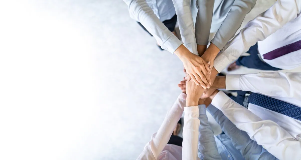Business leaders understand that teamwork is invaluable to the bottom line, and is never to be underestimated. (Redpixel/ShutterStock)