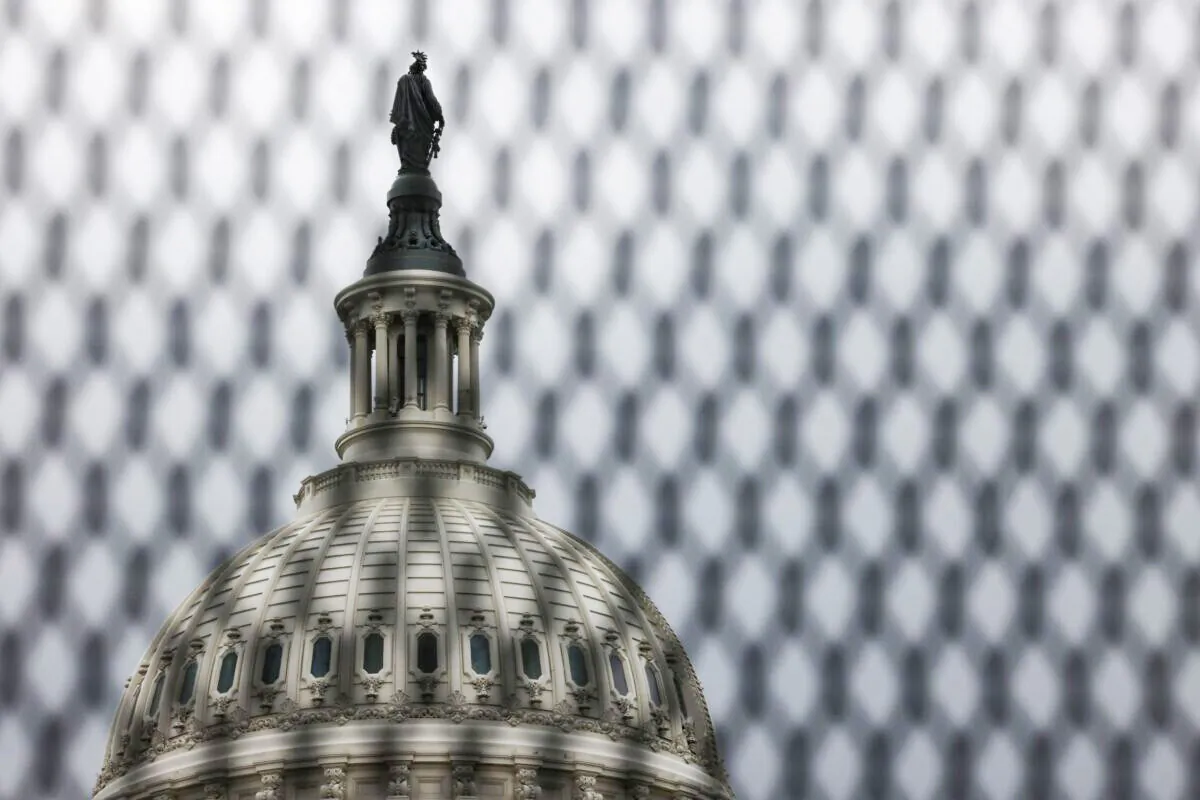 The U.S. Capitol building in Washington is seen on May 28, 2021, behind security fencing that was put up after the Jan. 6, 2021 breach. (Evelyn Hockstein/Reuters)
