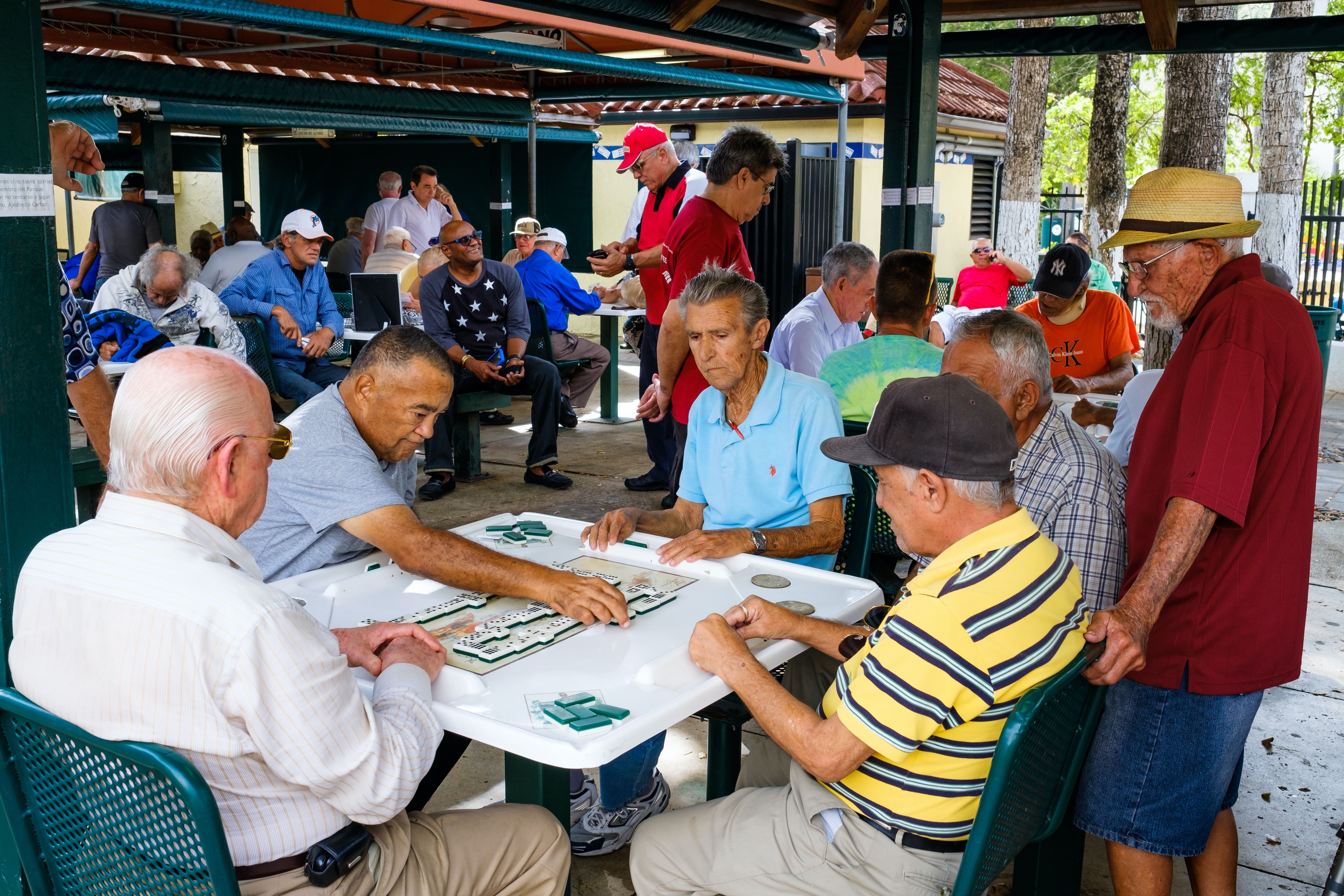 seniors playing domino in Domino Park, Little Havana