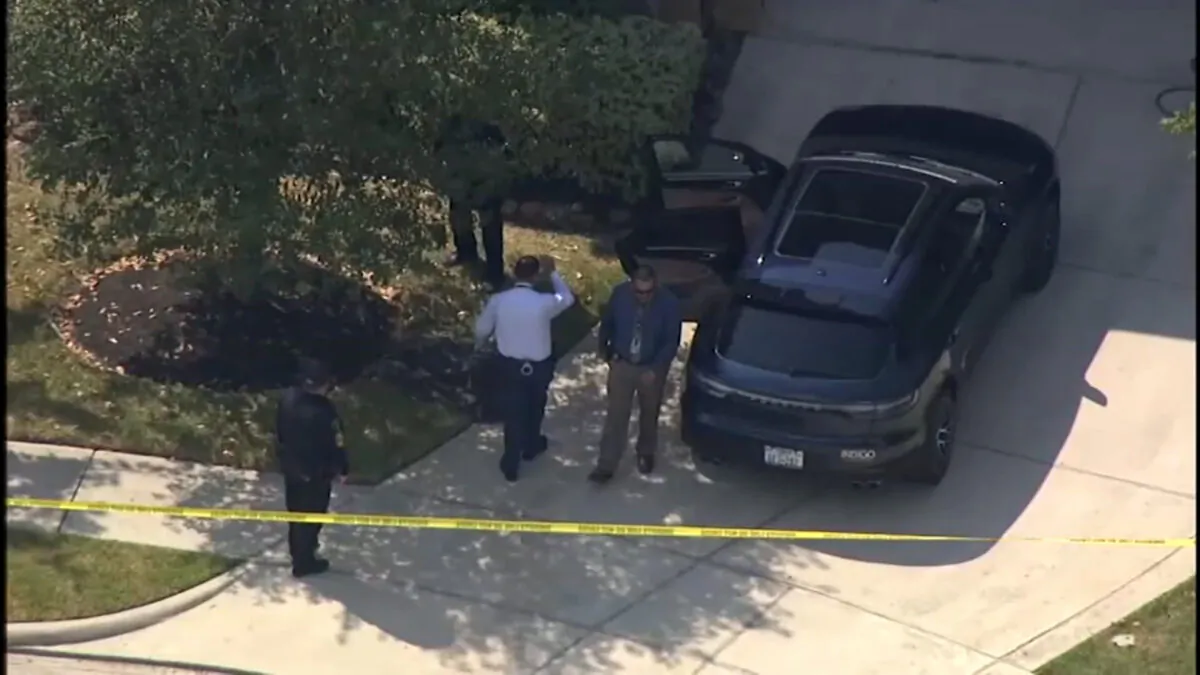 Police at a scene where a 5-year-old died after being left in a car for hours in Houston on June 20, 2022. (Courtesy of KTRK)