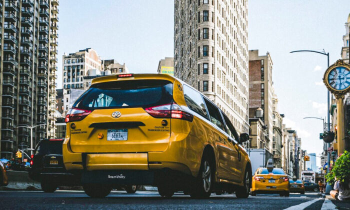 Stock photo of a taxi cab in New York's Flatiron District. (Lerone Pieters/Unsplash)