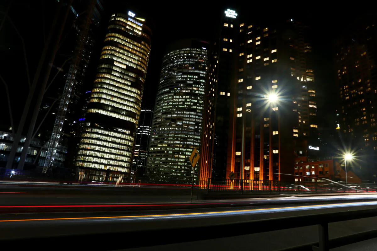 Office buildings are seen illuminated in the central business district in Sydney, Australia, on June 21, 2022. (Lisa Maree Williams/Getty Images)