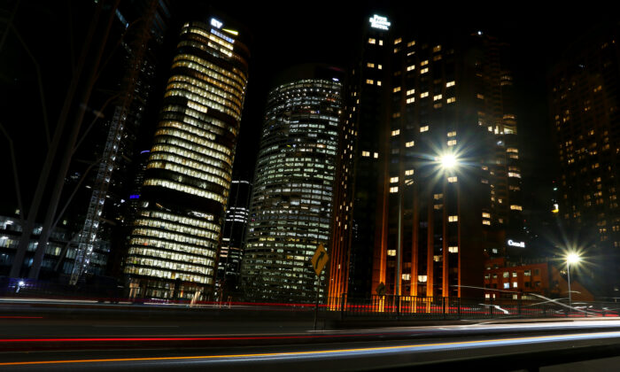 Office buildings are seen illuminated in the central business district in Sydney, Australia, on June 21, 2022. (Lisa Maree Williams/Getty Images)