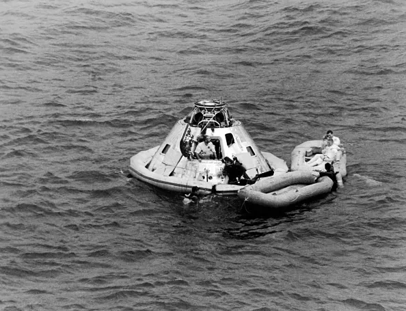 On March 13, 1969 in the Ocean, east of the Bahamas, astronauts James A. McDivitt, David R. Scott, and Russell L. Schweickart walking out from the cabin after the splashdown  of the Apollo 9 spacecraft, the first manned flight of the Command Service Module with the Lunar Module.  (NASA/AFP via Getty Images)