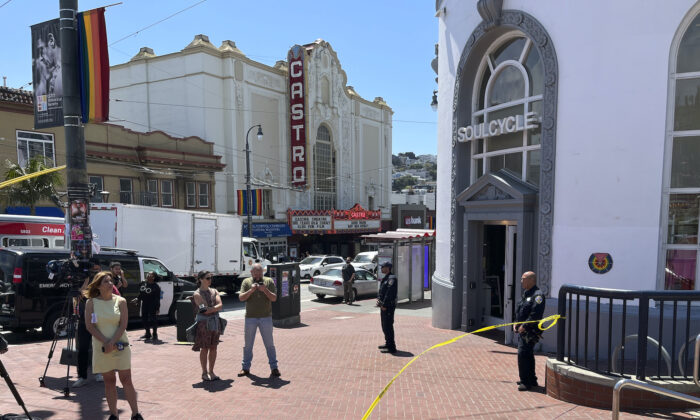 Police tape blocks the entrance to the Castro Muni Metro train station following a shooting in San Francisco, Wednesday, June 22, 2022. One person was killed and another was wounded in a shooting on a crowded subway train early Wednesday, Supervisor Myrna Melgar said.  (AP Photo/Janie Har)