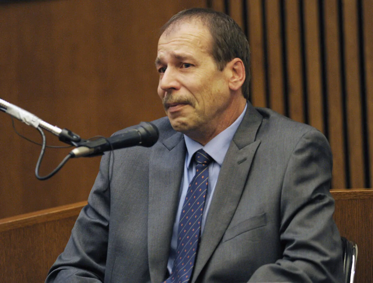 Ted Wafer, of Dearborn Heights, Mich., testifies in his own defense during his second degree murder trial in Detroit on Aug. 4, 2014. (Clarence Tabb Jr./Detroit News via AP)