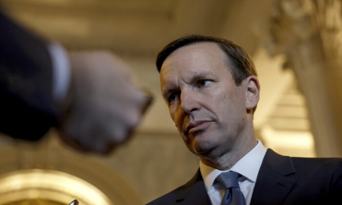 Sen. Chris Murphy (D-Conn.) speaks to reporters outside of the Senate Chambers of the U.S. Capitol in Washington, on June 21, 2022. (Anna Moneymaker/Getty Images)