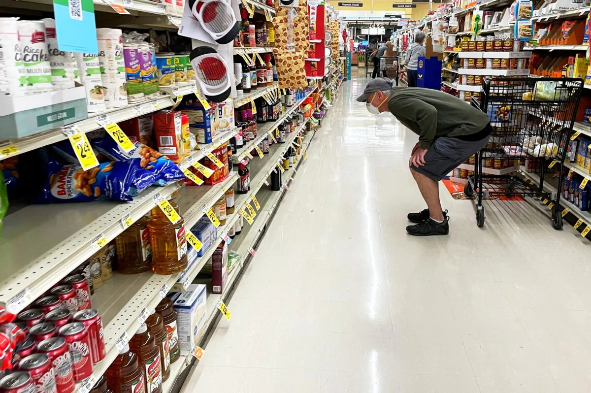 A man shops at a Safeway grocery store in Annapolis, Maryland, on May 16, 2022. (Jim Watson/AFP via Getty Images)