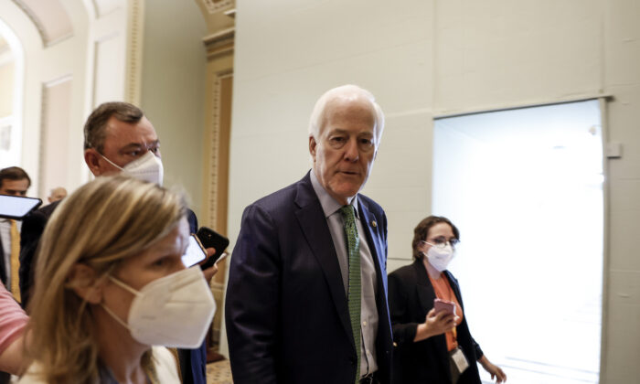 Sen. John Cornyn (R-Texas) speaks to reporters as he walks to the Senate Chambers of the U.S. Capitol in Washington, on June 21, 2022. (Anna Moneymaker/Getty Images)