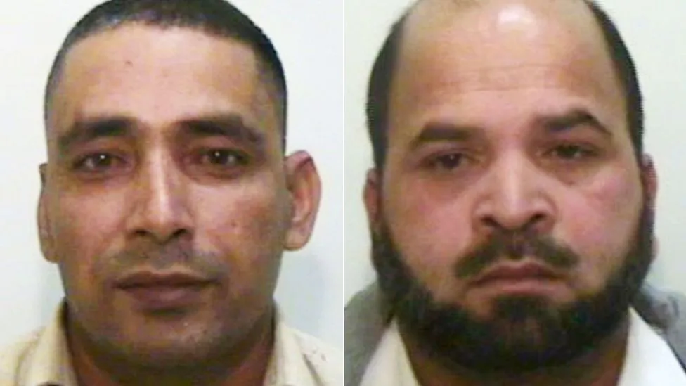 Adil Khan (left) and Qari Abdul Rauf after their arrest in Rochdale, England, in 2010. (Greater Manchester Police)