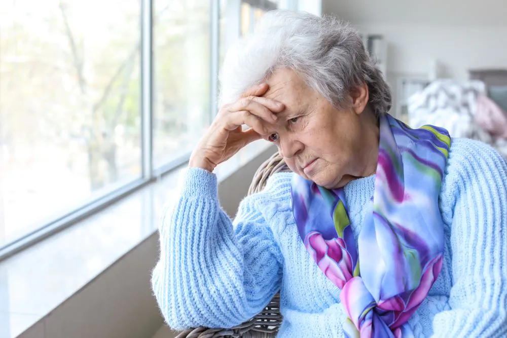 Elderly woman in aged care facility. (Pixel-Shot/Adobe Stock)