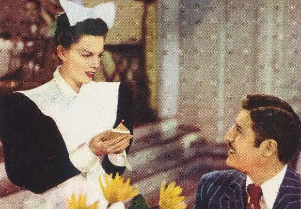 Scene from the film "The Harvey Girls" (1946) picturing Judy Garland and John Hodiak. (Public Domain)