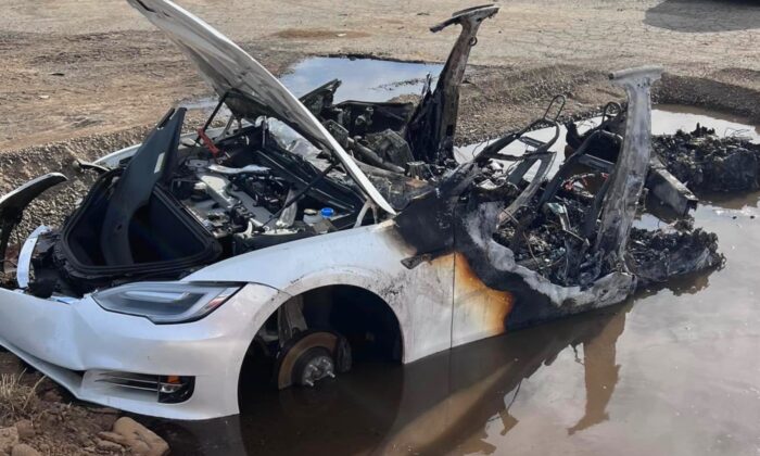 The Tesla Model S that spontaneously burst into flames at a wrecking yard in California. (Courtesy of Sacramento Metropolitan Fire Department)
