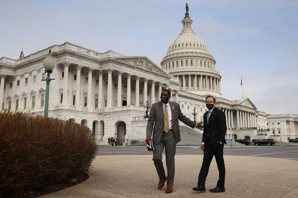 Rep. Burgess Owens (R-Utah) and Rep. John Curtis (R-Utah) arrive for a news conference about immigration outside the U.S. Capitol in Washington on March 17, 2021. (Chip Somodevilla/Getty Images)