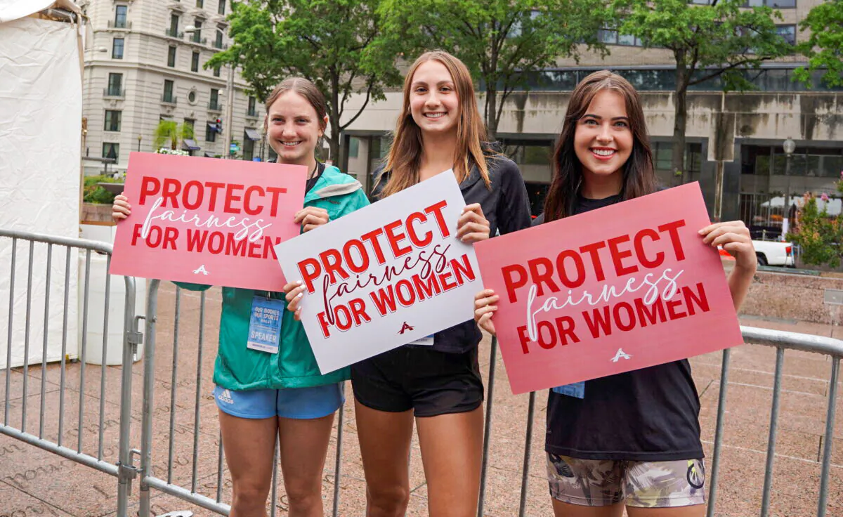 (L to R) Female athletes Mary Kate Marshall, Chelsea Mitchell, and Lainey Armistead at the “Our Bodies, Our Sports” rally for single-sex sports at the Freedom Plaza in Washington DC on June 23, 2022. (Terri Wu/The Epoch Times)