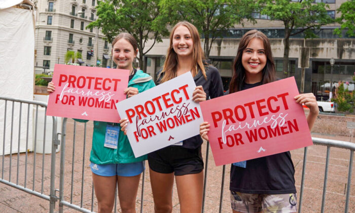 (L to R) Female athletes Mary Kate Marshall, Chelsea Mitchell, and Lainey Armistead at the “Our Bodies, Our Sports” rally for single-sex sports at the Freedom Plaza in Washington DC on June 23, 2022. (Terri Wu/The Epoch Times)