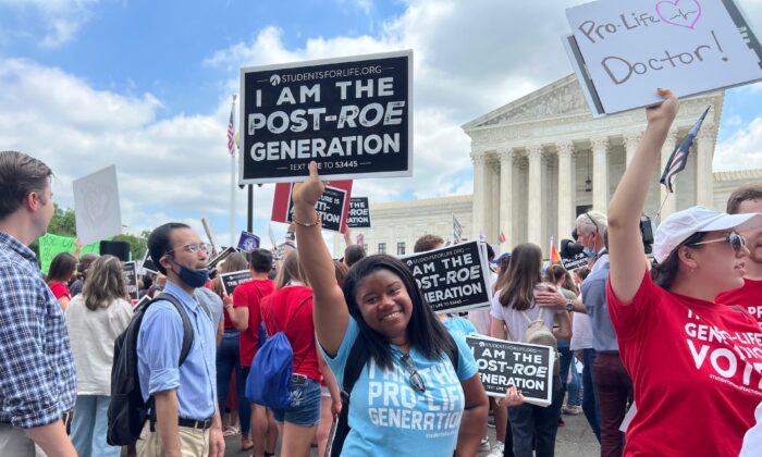 Pro-life leader Norvilia Etienne at the Supreme Court in Washington on June 24, 2022. (Emel Akan/The Epoch Times)